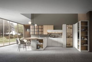 Luminosa e raffinata la cucina di Design della Collezione Eclettica di Scandola Mobili caratterizzata dalle basi, con un design  pulito, chiuse dall'anta Iride Bianco Fumo in legno di Rovere che la rende robusta e solida; il top è in HPL Gesso. Sono presenti una serie di pratiche colonne; i pensili e la cabina hanno le ante in Alluminio e vetro. Un modulo base da 60 cm con un'anta, prezzo a partire da 452 euro + IVA. www.scandolamobili.it Luminosa e raffinata la cucina di Design della Collezione Eclettica di Scandola Mobili caratterizzata dalle basi, con un design  pulito, chiuse dall'anta Iride Bianco Fumo in legno di Rovere che la rende robusta e solida; il top è in HPL Gesso. Sono presenti una serie di pratiche colonne; i pensili e la cabina hanno le ante in Alluminio e vetro. Un modulo base da 60 cm con un'anta, prezzo a partire da 452 euro + IVA. www.scandolamobili.it