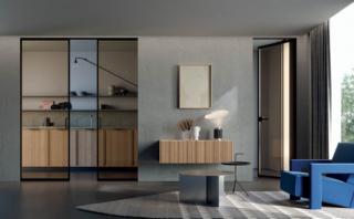 La gamma di porte scorrevoli Eclisse si arricchisce di una nuova collezione declinata in vetro e alluminio, materiali prettamente architettonici e contemporanei. Il sottile profilo metallico sottolinea la cura dei dettagli, impreziosendo il serramento, mentre il cristallo amplia le prospettive garantendo nel contempo luminosità e privacy, a seconda della tipologia delle lastre abbinate. Cinque i colori disponibili per il telaio di alluminio (bianco, alluminio, champagne, bronze, tobacco), mentre il vetro è presentato in nove diverse finiture: trasparente extra-chiaro, satinato extra-chiaro, fumé, fumé satinato, fumé reflex, bronzo, bronzo satinato, bronzo reflex, a specchio. Misure L 60-100 cm x H 200-270 cm. http://www.eclisse.it La gamma di porte scorrevoli Eclisse si arricchisce di una nuova collezione declinata in vetro e alluminio, materiali prettamente architettonici e contemporanei. Il sottile profilo metallico sottolinea la cura dei dettagli, impreziosendo il serramento, mentre il cristallo amplia le prospettive garantendo nel contempo luminosità e privacy, a seconda della tipologia delle lastre abbinate. Cinque i colori disponibili per il telaio di alluminio (bianco, alluminio, champagne, bronze, tobacco), mentre il vetro è presentato in nove diverse finiture: trasparente extra-chiaro, satinato extra-chiaro, fumé, fumé satinato, fumé reflex, bronzo, bronzo satinato, bronzo reflex, a specchio. Misure L 60-100 cm x H 200-270 cm. http://www.eclisse.it