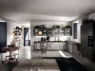 Veste perfettamente l'angolo la cucina della collezione Diesel Get Together di Scavolini realizzata in collaborazione con Diesel Living: ha le ante delle basi in decorativo Soft Concrete con maniglia ponte Softcut e il piano in Dekton Embers. I pensili squadrati con le ante in vetro Soft Industrial Glass completano la composizione; lateralmente è presente un comodo piano snack in laminato Burnt Wood con sostegno verniciato Titanio. Prezzo su richiesta. www.scavolini.com Veste perfettamente l'angolo la cucina della collezione Diesel Get Together di Scavolini realizzata in collaborazione con Diesel Living: ha le ante delle basi in decorativo Soft Concrete con maniglia ponte Softcut e il piano in Dekton Embers. I pensili squadrati con le ante in vetro Soft Industrial Glass completano la composizione; lateralmente è presente un comodo piano snack in laminato Burnt Wood con sostegno verniciato Titanio. Prezzo su richiesta. www.scavolini.com
