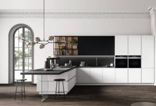 Il laccato opaco bianco puro delle ante lisce illumina la cucina a penisola Time di Arredo3; accanto ai pensili, in laccato opaco nero che dà vita ad un ricercato effetto optical, trovano posto gli elementi a giorno Rubik con la struttura in metallo brunito che sorregge lo schienale e i ripiani in rovere naturale. Le colonne posizionate su un lato rendono lo spazio ampio e fruibile; il top è realizzato in laminato speciale 1213. Prezzo su richiesta. www.arredo3.it Il laccato opaco bianco puro delle ante lisce illumina la cucina a penisola Time di Arredo3; accanto ai pensili, in laccato opaco nero che dà vita ad un ricercato effetto optical, trovano posto gli elementi a giorno Rubik con la struttura in metallo brunito che sorregge lo schienale e i ripiani in rovere naturale. Le colonne posizionate su un lato rendono lo spazio ampio e fruibile; il top è realizzato in laminato speciale 1213. Prezzo su richiesta. www.arredo3.it