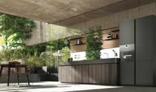 La composizione a parete, che può accogliere persino un mini garden, è attrezzata con mensole su boiserie e con uno schienale magnetico luminoso  per gli utensili, che possono essere attaccati  e spostati a piacere. Progettata da Stefano Boeri Architetti, Oasi di Aran Cucine è composta da basi con ante lisce realizzate con legno ossidato, colonne con ante laccate Verde Comodoro e boiserie con mensole in metallo. Il top è in Corian® con lavello integrato. Prezzo da rivenditore. www.arancucine.it La composizione a parete, che può accogliere persino un mini garden, è attrezzata con mensole su boiserie e con uno schienale magnetico luminoso  per gli utensili, che possono essere attaccati  e spostati a piacere. Progettata da Stefano Boeri Architetti, Oasi di Aran Cucine è composta da basi con ante lisce realizzate con legno ossidato, colonne con ante laccate Verde Comodoro e boiserie con mensole in metallo. Il top è in Corian® con lavello integrato. Prezzo da rivenditore. www.arancucine.it