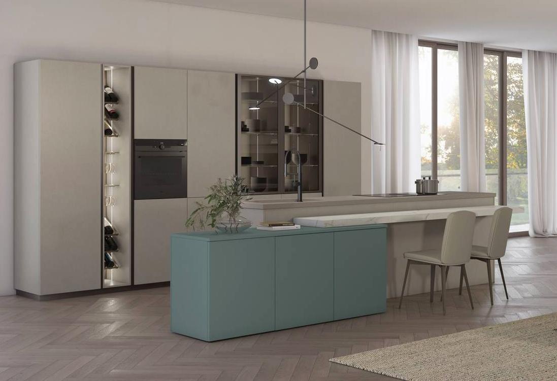 Colori freschi per la cucina senza pensili Immagina di Lube che trova posto nella zona giorno: l'isola centrale ha le ante in Laccato Verde Nilo Opaco e il Work-top in Fenix Beige Arizona. Le colonne che danno vita alla capiente armadiatura a parete, corredata di vetrine e vani a giorno, sono in Rigatino Avena. Lateralmente è presente un piano snack in Laminato Yule White effetto marmo bianco. Un modulo base da 60 cm con due cestoni senza top, prezzo 379 euro + IVA. www.cucinelube.it Colori freschi per la cucina senza pensili Immagina di Lube che trova posto nella zona giorno: l'isola centrale ha le ante in Laccato Verde Nilo Opaco e il Work-top in Fenix Beige Arizona. Le colonne che danno vita alla capiente armadiatura a parete, corredata di vetrine e vani a giorno, sono in Rigatino Avena. Lateralmente è presente un piano snack in Laminato Yule White effetto marmo bianco. Un modulo base da 60 cm con due cestoni senza top, prezzo 379 euro + IVA. www.cucinelube.it