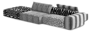 Il divano da esterni Dahlak di Roberto Cavalli Home Interiors è ampio e confortevole, realizzato con materiali che garantiscono la massima resistenza agli agenti atmosferici, con una linea compatta e squadrata. Il rivestimento sfoderabile in tela idrorepellente, nei toni del bianco e del nero con il tipico pattern animalier, zebra, giraffa e giaguaro, lo rende contemporaneo e scenografico. Misura L 409 x P 211 x H 64 cm. www.robertocavalli.com Il divano da esterni Dahlak di Roberto Cavalli Home Interiors è ampio e confortevole, realizzato con materiali che garantiscono la massima resistenza agli agenti atmosferici, con una linea compatta e squadrata. Il rivestimento sfoderabile in tela idrorepellente, nei toni del bianco e del nero con il tipico pattern animalier, zebra, giraffa e giaguaro, lo rende contemporaneo e scenografico. Misura L 409 x P 211 x H 64 cm. www.robertocavalli.com
