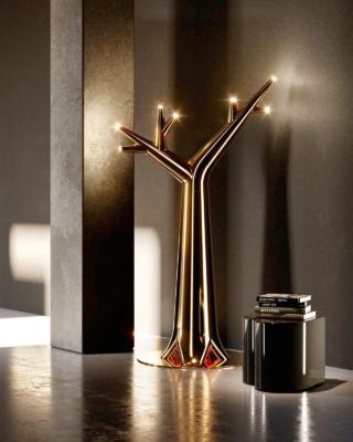 La lampada da terra Albero di Artwork Italian Heritage by Kerasan ha l'aspetto di un'imponente scultura luminosa: la struttura è in ceramica nella finitura luxury oro e poggia su una base metallica. I punti luce a led a luce bianca sono posti alle estremità dei rami. Misura H 215 cm. www.artworkitalianheritage.it La lampada da terra Albero di Artwork Italian Heritage by Kerasan ha l'aspetto di un'imponente scultura luminosa: la struttura è in ceramica nella finitura luxury oro e poggia su una base metallica. I punti luce a led a luce bianca sono posti alle estremità dei rami. Misura H 215 cm. www.artworkitalianheritage.it