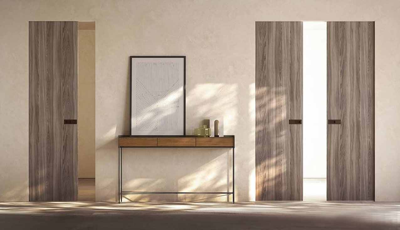 Disponibile per anta singola o doppia, il controtelaio Absolute Evo di Ermetika ha profili in alluminio senza stipiti e coprifili, per pareti in muratura o cartongesso. Varie le finiture del pannello. Nella misura L 80 x H 210 cm con anta grezza costa 852 euro + Iva. www.ermetika.com