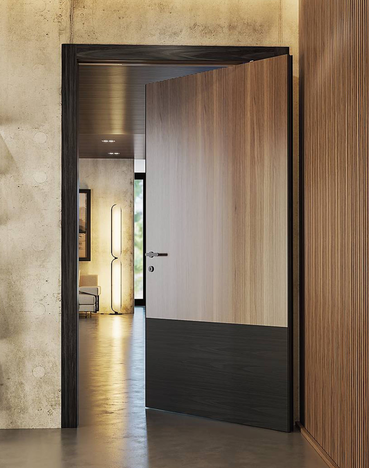 La porta M14 della linea Madera di Flessya ha apertura rototraslante, che ruota a 90° e si sposta da un lato. Duplice la finitura: rovere bruciato o nero, come la cornice a parete. Con maniglia Pipita nero dai contorni stondati costa 876 euro + Iva. www.flessya.com
