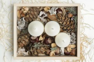 Simple and small home decoration with candles in wooden box. Simple and small home decoration with candles in wooden box.