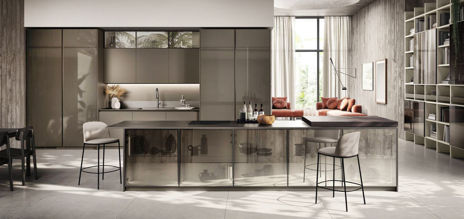 Nell’immagine, cucina Libra di Scavolini, design Vuesse: la composizione lineare sullo sfondo ha le colonne con ante laccate dogate lucide effetto perlato Cuvée, abbinate alle ante delle basi e dei pensili in laccato opaco Effetto perlato Cuvée; piano cucina in Acciaio Inox finitura Acciaio Scuro. Gola Round, orizzontale per le basi e verticale per le colonne, in laccato opaco nella stessa tonalità dell'anta.
Isola con ante telaio Alluminio finitura Acciaio Scuro con vetro Stopsol Chiaro e laccato opaco Tortora; piano top con lavello integrato in Acciaio Inox finitura Acciaio Scuro. Nell’immagine, cucina Libra di Scavolini, design Vuesse: la composizione lineare sullo sfondo ha le colonne con ante laccate dogate lucide effetto perlato Cuvée, abbinate alle ante delle basi e dei pensili in laccato opaco Effetto perlato Cuvée; piano cucina in Acciaio Inox finitura Acciaio Scuro. Gola Round, orizzontale per le basi e verticale per le colonne, in laccato opaco nella stessa tonalità dell'anta.
Isola con ante telaio Alluminio finitura Acciaio Scuro con vetro Stopsol Chiaro e laccato opaco Tortora; piano top con lavello integrato in Acciaio Inox finitura Acciaio Scuro.
