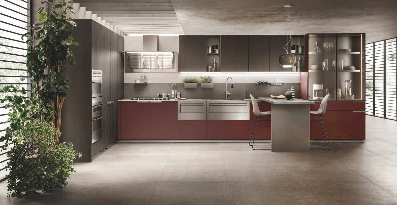 Cucina MIA by Carlo Cracco di Scavolini: basi con ante in Fenix NTM® Rosso Jaipur, pensili e colonne con ante in impiallacciato Rovere Carbone; maniglie in metallo finitura Acciaio satinato; piano di lavoro è in Acciaio Scuro con zona lavaggio integrata e schienale coordinato completato dal progetto Line System. Piano snack in Acciaio Scuro e vetrine con ante a telaio alluminio finitura Acciaio Scuro e vetro Stopsol chiaro. Cucina MIA by Carlo Cracco di Scavolini: basi con ante in Fenix NTM® Rosso Jaipur, pensili e colonne con ante in impiallacciato Rovere Carbone; maniglie in metallo finitura Acciaio satinato; piano di lavoro è in Acciaio Scuro con zona lavaggio integrata e schienale coordinato completato dal progetto Line System. Piano snack in Acciaio Scuro e vetrine con ante a telaio alluminio finitura Acciaio Scuro e vetro Stopsol chiaro.