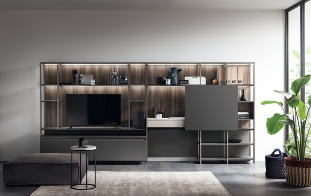 La parete attrezzata Formalia di Scavolini consente di ricavare un pratico angolo studio nella zona living grazie al piano scrivania estraibile in decorativo Home Matter che, quando non serve, “scompare” all'interno della struttura. Le basi, il piano, i ripiani e le ante scorrevoli sono laccate opaco Grigio Ferro, una tonalità elegante e facile da ambientare; il Sistema Parete Status nella finitura Titanio ha lo schienale in decorativo Noce Garden. Prezzo su richiesta. www.scavolini.com La parete attrezzata Formalia di Scavolini consente di ricavare un pratico angolo studio nella zona living grazie al piano scrivania estraibile in decorativo Home Matter che, quando non serve, “scompare” all'interno della struttura. Le basi, il piano, i ripiani e le ante scorrevoli sono laccate opaco Grigio Ferro, una tonalità elegante e facile da ambientare; il Sistema Parete Status nella finitura Titanio ha lo schienale in decorativo Noce Garden. Prezzo su richiesta. www.scavolini.com