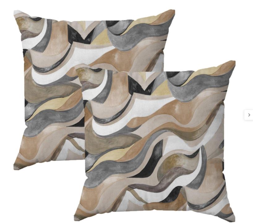 I cuscini Waves (Ref. 86838014) sono rivestiti in tessuto di cotone con un motivo astratto nei toni del marrone. Misurano L 42 x P 42 cm. Prezzo 18,99 euro (per il set da 2 pezzi).