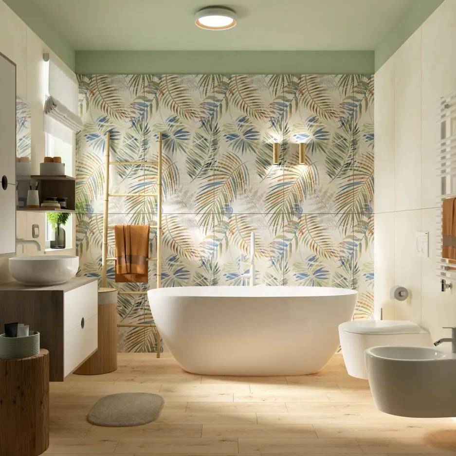 Il bagno è caratterizzato dal rivestimento Art Color Leaf DEC effetto carta da parati con un delicato motivo foliage in gres porcellanato. Una piastrella misura 60 x 119,8 cm, prezzo 26,99 al mq. Il pavimento in gres effetto legno è Nilo natural, ogni piastrella misura 20 x 60 cm, prezzo al mq 17,99 euro. La vasca a isola ovale Lea Bianco Misura L 160 x P 74 cm, prezzo 1.149 euro. Il bagno è caratterizzato dal rivestimento Art Color Leaf DEC effetto carta da parati con un delicato motivo foliage in gres porcellanato. Una piastrella misura 60 x 119,8 cm, prezzo 26,99 al mq. Il pavimento in gres effetto legno è Nilo natural, ogni piastrella misura 20 x 60 cm, prezzo al mq 17,99 euro. La vasca a isola ovale Lea Bianco Misura L 160 x P 74 cm, prezzo 1.149 euro.