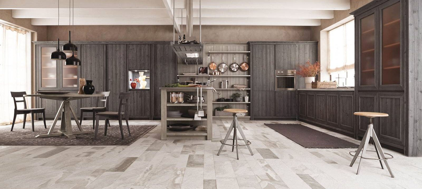 Fa parte della collezione Maestrale di Scandola Mobili la grande cucina angolare M02 che è composta da una sezione operativa separata dalla zona pranzo per mezzo della penisola attrezzata con i fuochi e sovrastata dalla cappa. Gli arredi sono realizzati in legno massello di abete nelle finiture Grafite e color Ardesia; il top è in vera pietra. Un modulo base da 60 cm con un'anta, prezzo 474 euro + Iva. www.scandolamobili.it Fa parte della collezione Maestrale di Scandola Mobili la grande cucina angolare M02 che è composta da una sezione operativa separata dalla zona pranzo per mezzo della penisola attrezzata con i fuochi e sovrastata dalla cappa. Gli arredi sono realizzati in legno massello di abete nelle finiture Grafite e color Ardesia; il top è in vera pietra. Un modulo base da 60 cm con un'anta, prezzo 474 euro + Iva. www.scandolamobili.it