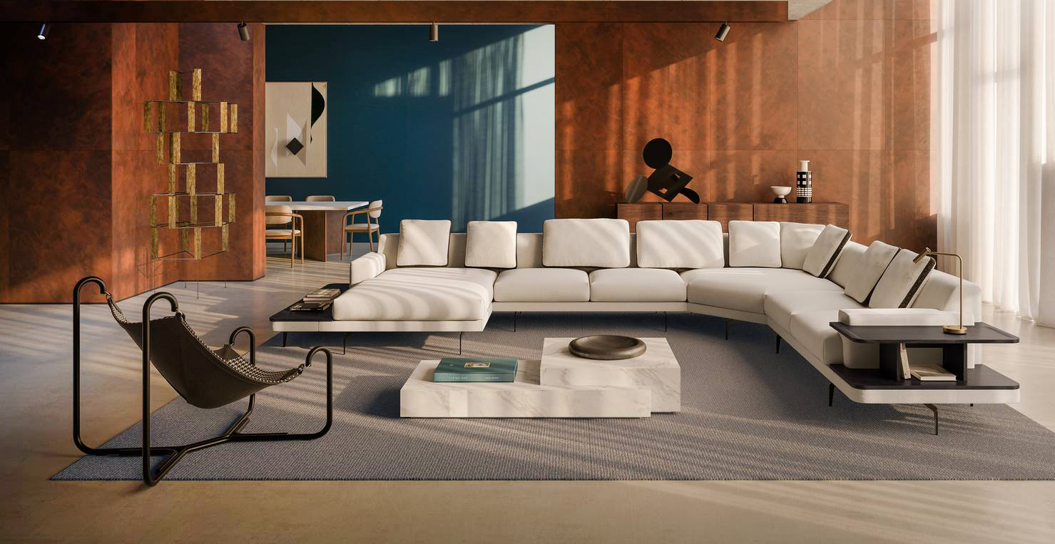 Il modello angolare Gilmour di Busnelli è caratterizzzato da una sapiente alternanza fra pieni e vuoti; è componibile grazie ai sedici moduli dotati di un basamento poggiante su esili piedini in metallo. È disponibile rivestito in tessuto o in pelle ed è sfoderabile. Lo schienale, formato da un unico pezzo, offre il massimo sostegno in ogni punto. Può essere completato con un piano di appoggio con il bordo rialzato e con un pratico contenitore a giorno, entrambi realizzati in frassino.        https://www.busnelli.com – Fuorisalone, Showcase Arrital – Corso Europa 22, Milano.