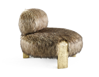 Scenografica e glamour la poltrona Toulou di Roberto Cavalli Home Interiors che abbina una linea morbida e avvolgente al soffice e caldo rivestimento in eco-pelliccia. Le gambe in massello di pioppo con la finitura dorata  e materica Textured Gold la impreziosiscono. Misura L 86 x P 86 x H 71 cm. https://robertocavallihomeinteriors.onirogroup.it - Salone del Mobile, padiglione 15, stand A19-B16.