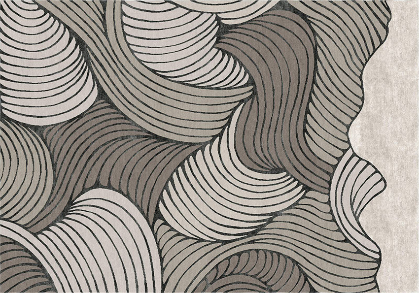 Atelier Tapis Rouge presenta il tappeto Groviglio della collezione Inganni Spaziali, firmata Armando Milani, ispirata alle opere analogiche appartenenti agli anni Settanta contraddistinte da libertà espressiva, coraggio della sperimentazione e da un approccio spontaneo e giocoso. È realizzato in lana e seta; la superficie evoca i moti ondosi presenti in natura, intrecci vegetali, grovigli di matasse che metaforicamente, in una dimensione psichica, diventano grovigli di pensieri.  https://tapisrouge.it - Fuorisalone, Showroom Atelier Tapis Rouge, Via dell'Annunciata 26, Milano