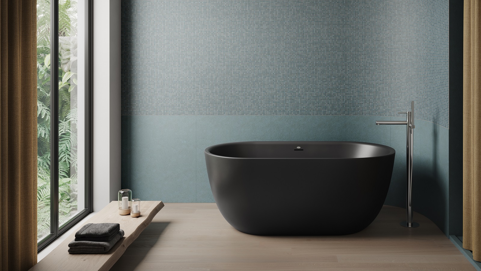 L’elegante vasca freestanding di forma ovale Chic di Jacuzzi è la più compatta della gamma Lounge. Grazie alle sue dimensioni contenute è ideale anche per ambienti bagno non particolarmente grandi. In foto nella finitura black. www.jacuzzi.com  - Salone del Mobile, padiglione 10, stand D23 presso Cordivari Design.