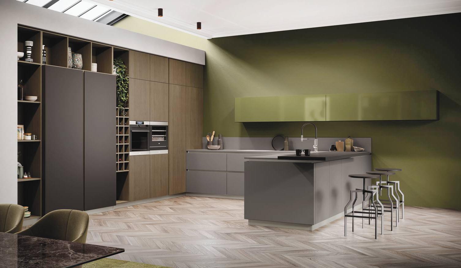 Ha una lunga penisola con piano snack Fenix Cacao Orinoco la cucina AL32 di Arrex che ha le basi in Fenix Grigio Londra impreziosite dal telaio Champagne. I pensili a sviluppo orizzontale hanno le ante in vetro Verde Oliva. Un modulo base da 60 cm, prezzo 360 euro + IVA. www.arrex.it Ha una lunga penisola con piano snack Fenix Cacao Orinoco la cucina AL32 di Arrex che ha le basi in Fenix Grigio Londra impreziosite dal telaio Champagne. I pensili a sviluppo orizzontale hanno le ante in vetro Verde Oliva. Un modulo base da 60 cm, prezzo 360 euro + IVA. www.arrex.it