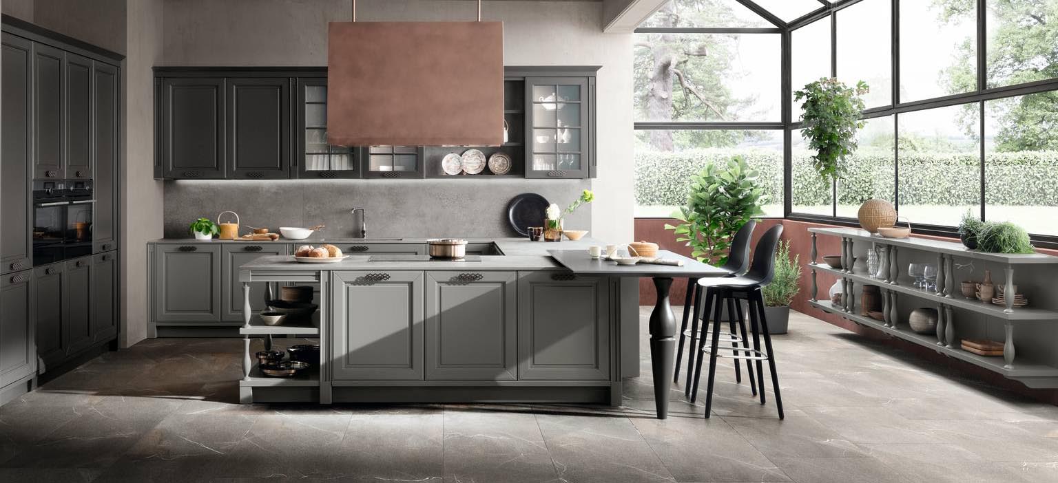 Stile classico per Dolcevita di Stosa, la grande cucina che si articola in una serie di elementi con le ante a telaio in laccato Fumo opaco; le colonne sono in laccato Carbon opaco. Un modulo base da 60 cm, prezzo a partire da 280 euro + Iva. www.stosacucine.com Stile classico per Dolcevita di Stosa, la grande cucina che si articola in una serie di elementi con le ante a telaio in laccato Fumo opaco; le colonne sono in laccato Carbon opaco. Un modulo base da 60 cm, prezzo a partire da 280 euro + Iva. www.stosacucine.com