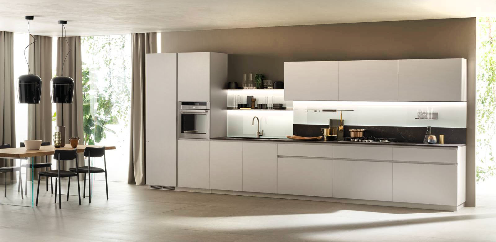 Si sviluppa sulla parete la cucina DeLinea di Scavolini che ha le ante lisce delle basi e dei pensili in laccato opaco Grigio Chiaro, dotate di profili e gole a fascia piatta in alluminio incassato, che la rendono facile da pulire. Il piano è realizzato in Dekton® Kelya; le mensole in acciaio si trasformano in un dettaglio decorativo. Prezzo su richiesta. www.scavolini.com Si sviluppa sulla parete la cucina DeLinea di Scavolini che ha le ante lisce delle basi e dei pensili in laccato opaco Grigio Chiaro, dotate di profili e gole a fascia piatta in alluminio incassato, che la rendono facile da pulire. Il piano è realizzato in Dekton® Kelya; le mensole in acciaio si trasformano in un dettaglio decorativo. Prezzo su richiesta. www.scavolini.com