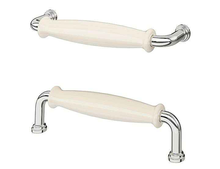 La maniglia dal sapore retro Klingstorp di Ikea a effetto porcellana, in bianco (o nero) opaco e alluminio cromato, misura L 14,1 cm. La coppia costa 7 euro.  www.ikea.com