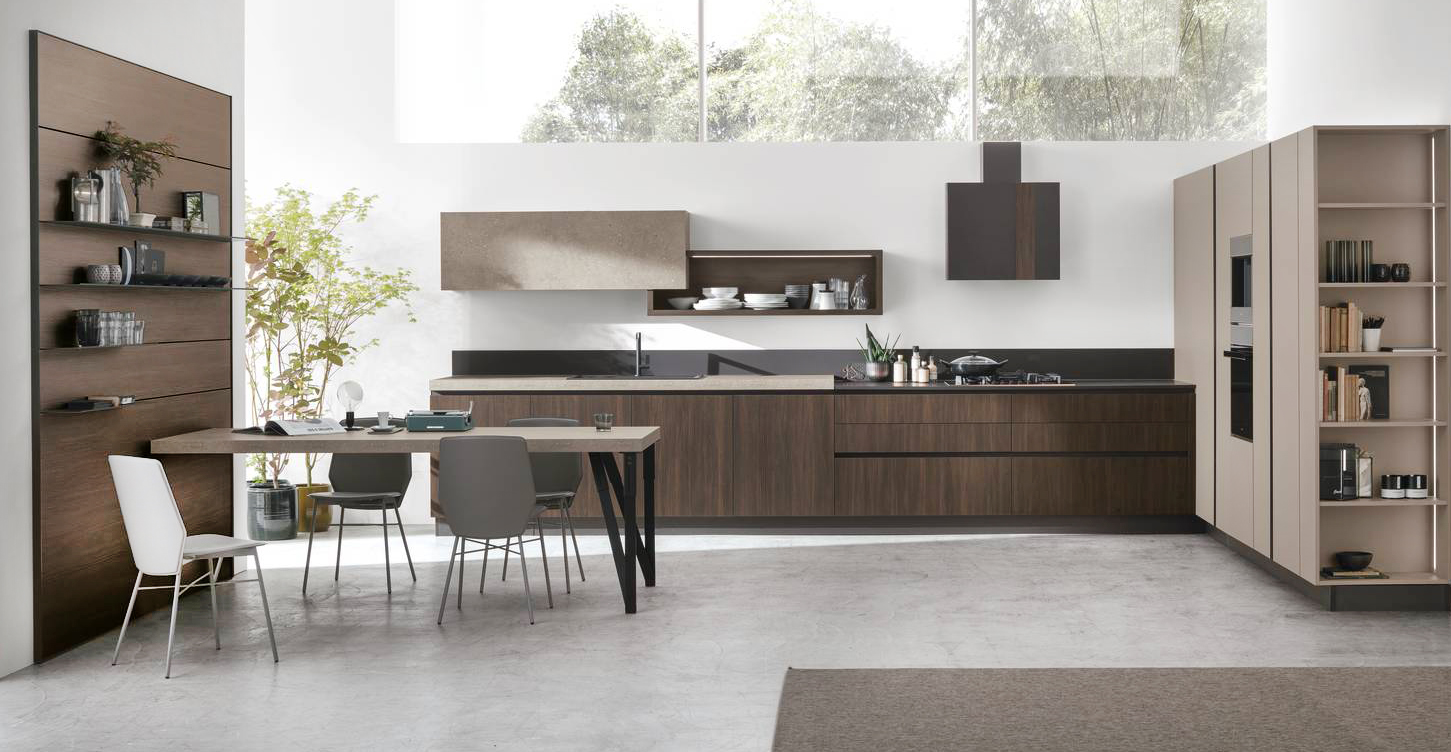 Ante lisce nella finitura Rovere Cumino per le basi della cucina angolare Infinity di Stosa che ha il piano in Graniglia Limo. Le colonne in Pet Ginseng opaco danno vita a una grande armadiatura laterale che accoglie la dispensa e i forni. Un modulo base da 60 cm, prezzo a partire da 150 euro + IVA. www.stosacucine.com Ante lisce nella finitura Rovere Cumino per le basi della cucina angolare Infinity di Stosa che ha il piano in Graniglia Limo. Le colonne in Pet Ginseng opaco danno vita a una grande armadiatura laterale che accoglie la dispensa e i forni. Un modulo base da 60 cm, prezzo a partire da 150 euro + IVA. www.stosacucine.com