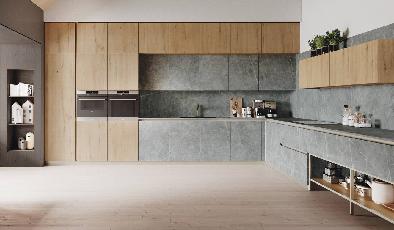 Gres effetto pietra, nei toni del grigio con venature bianche, per le ante, il piano di lavoro e lo schienale della composizione angolare AL32 di Arrex Le Cucine. I pensili a sviluppo orizzontale e le colonne in Rovere Spaccato Naturale “scaldano” l'ambiente e ne sottolineano lo stile nordico. Prezzo su richiesta. www.arrex.it Gres effetto pietra, nei toni del grigio con venature bianche, per le ante, il piano di lavoro e lo schienale della composizione angolare AL32 di Arrex Le Cucine. I pensili a sviluppo orizzontale e le colonne in Rovere Spaccato Naturale “scaldano” l'ambiente e ne sottolineano lo stile nordico. Prezzo su richiesta. www.arrex.it