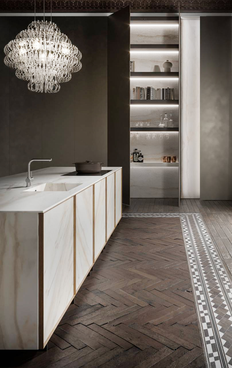 L'isola attrezzata della cucina Frame Lab di Modulnova ha il piano e i frontali delle ante, con una cornice in noce massello, realizzati in pregiato marmo Bianco Lasa con una raffinata venatura dorata e con la finitura “azerocare”, un trattamento certificato e brevettato da Antolini che garantisce la massima protezione idro e olio repellente contro macchie e corrosione. Prezzo su richiesta. www.modulnova.it L'isola attrezzata della cucina Frame Lab di Modulnova ha il piano e i frontali delle ante, con una cornice in noce massello, realizzati in pregiato marmo Bianco Lasa con una raffinata venatura dorata e con la finitura “azerocare”, un trattamento certificato e brevettato da Antolini che garantisce la massima protezione idro e olio repellente contro macchie e corrosione. Prezzo su richiesta. www.modulnova.it