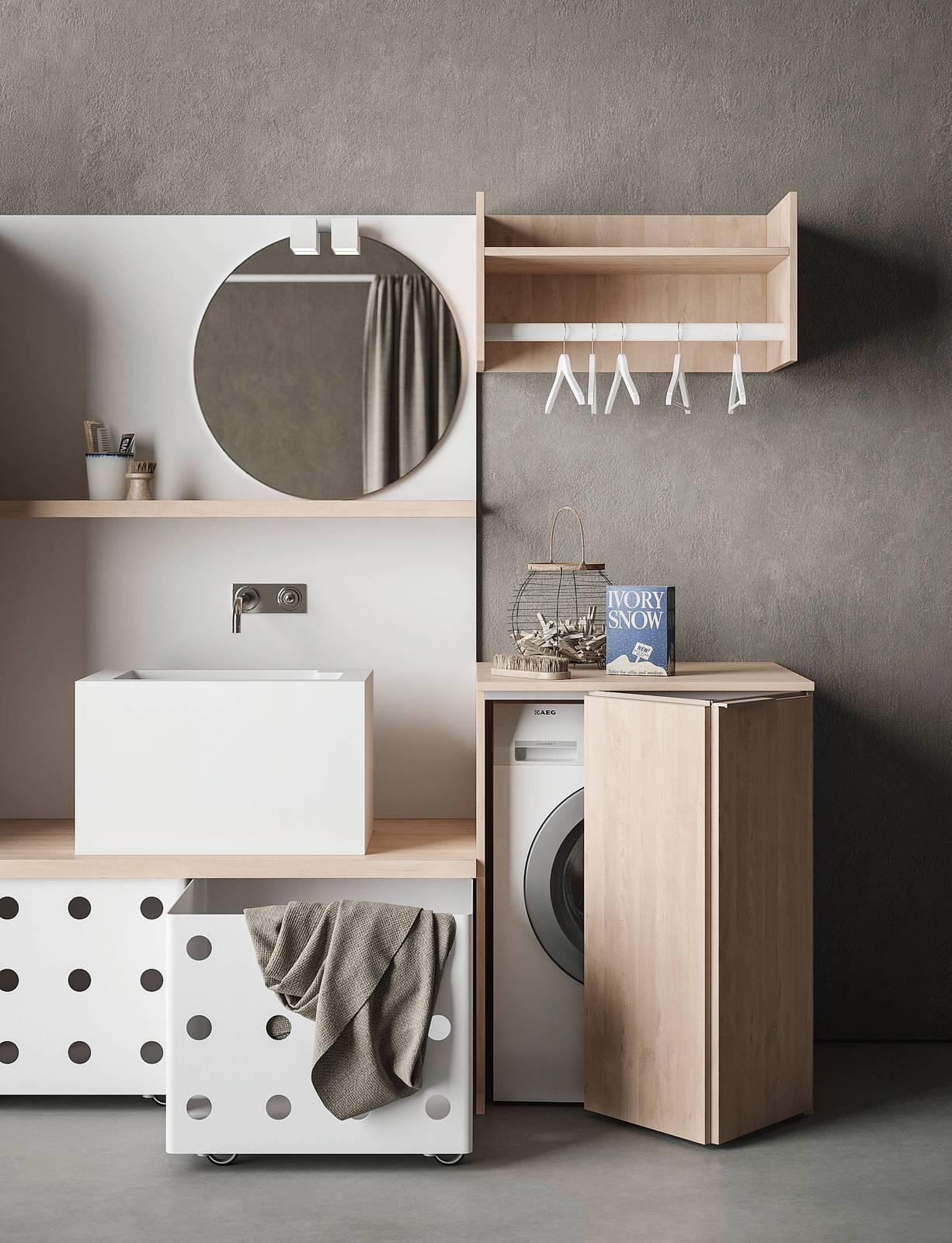 La collezione bagno-lavanderia Drop di Novello è caratterizzata dall'ampio lavabo in Teknorit bianco e da una ricca serie di elementi e accessori, come le basi in nobilitato con ante a libro, i pensili laccati con i ripiani, i cestoni in alluminio su ruote, i tubi appendiabiti, i vani a giorno e lo specchio. La composizione in foto misura L 186 x P 70 cm. Prezzo, Iva esclusa, 3.543 euro. www.novello.it