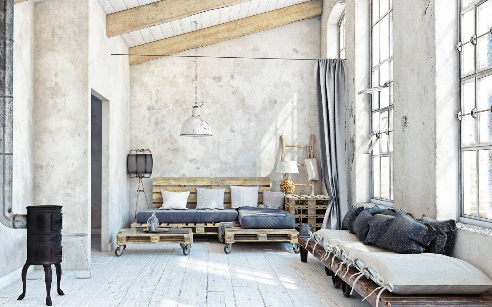 Soggiorno con divano in pallet in un loft in stile industriale