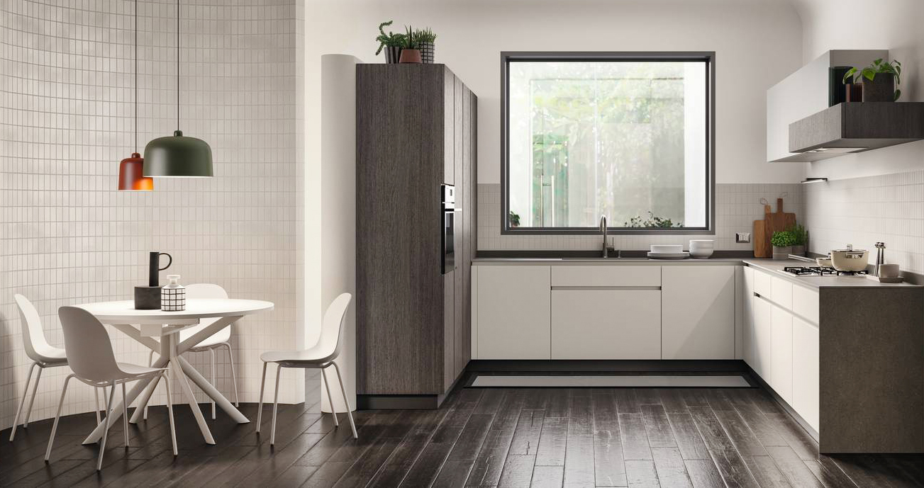 Nella cucina Libra di Scavolini la finestra si trasforma in un elemento decorativo e funzionale, un vero e proprio “quadro di luce”. La composizione a golfo ha le ante laccate opache Bianco Prestige in contrasto con quelle dei pensili in laccato dogato opaco Grigio Airone. Le colonne in decorativo Oriental, coordinate con il pensile con cappa integrata “Clopen”, danno vita ad una armadiatura a parete. Il piano cucina è in Gres Porcellanato Brown Earth. Prezzo su richiesta. www.scavolini.com Nella cucina Libra di Scavolini la finestra si trasforma in un elemento decorativo e funzionale, un vero e proprio “quadro di luce”. La composizione a golfo ha le ante laccate opache Bianco Prestige in contrasto con quelle dei pensili in laccato dogato opaco Grigio Airone. Le colonne in decorativo Oriental, coordinate con il pensile con cappa integrata “Clopen”, danno vita ad una armadiatura a parete. Il piano cucina è in Gres Porcellanato Brown Earth. Prezzo su richiesta. www.scavolini.com