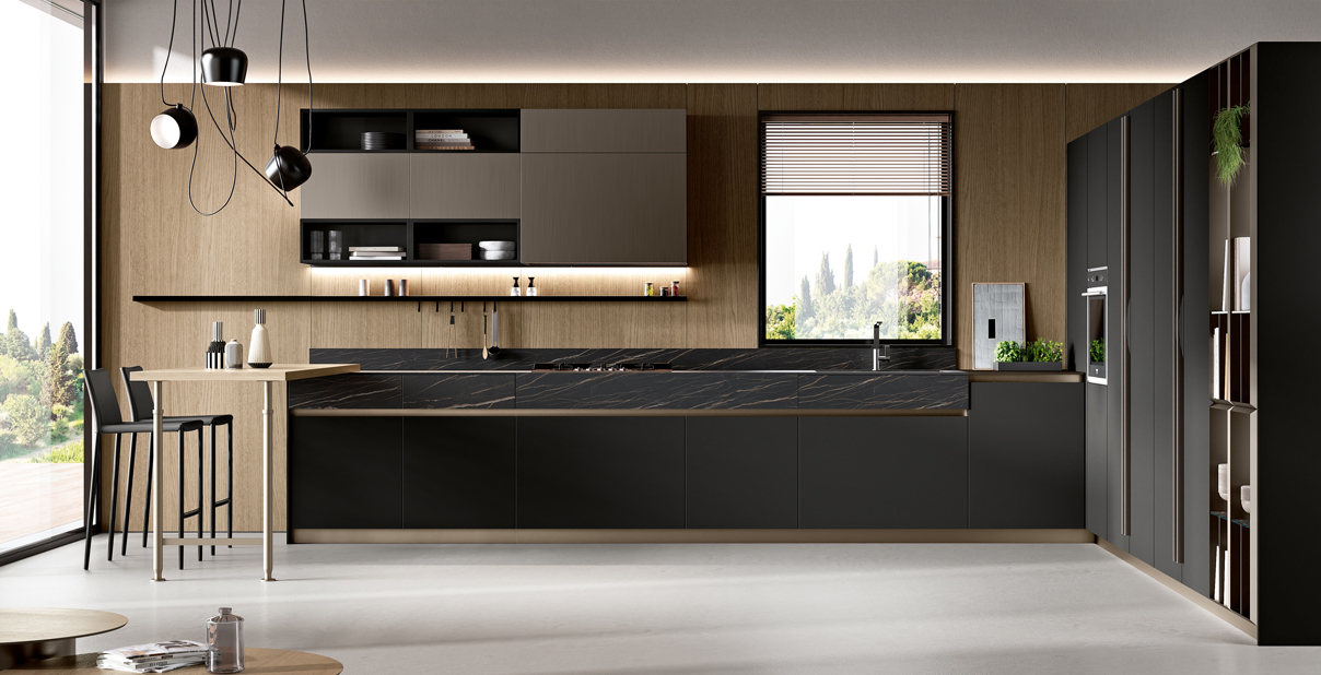 Ha le ante Square in Pet nero opaco la cucina modulare Origina di Febal Casa che si articola intorno alla finestra incorniciandola. Il piano in Laminam Noir Desir opaco dà vita ad una superficie fluida e facile da pulire; il bancone snack con il piano in laminato Rovere Europeo completa la composizione. Prezzo su richiesta. www.febalcasa.com Ha le ante Square in Pet nero opaco la cucina modulare Origina di Febal Casa che si articola intorno alla finestra incorniciandola. Il piano in Laminam Noir Desir opaco dà vita ad una superficie fluida e facile da pulire; il bancone snack con il piano in laminato Rovere Europeo completa la composizione. Prezzo su richiesta. www.febalcasa.com