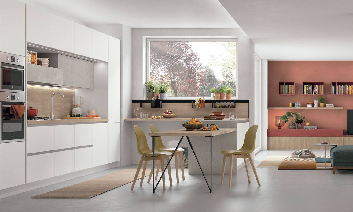 Luminosa e fresca la composizione a portale Young di Stosa Cucine che si sviluppa anche sotto la finestra e si apre sulla zona giorno. Le basi, i pensili e le colonne sono coordinati nella finitura Artico. Lo schienale attrezzato Joy System, posizionato sotto la finestra, mette in collegamento la zona operativa con la penisola. Un modulo base da 60 cm, prezzo a partire da 150 euro + Iva. www.stosacucine.com Luminosa e fresca la composizione a portale Young di Stosa Cucine che si sviluppa anche sotto la finestra e si apre sulla zona giorno. Le basi, i pensili e le colonne sono coordinati nella finitura Artico. Lo schienale attrezzato Joy System, posizionato sotto la finestra, mette in collegamento la zona operativa con la penisola. Un modulo base da 60 cm, prezzo a partire da 150 euro + Iva. www.stosacucine.com