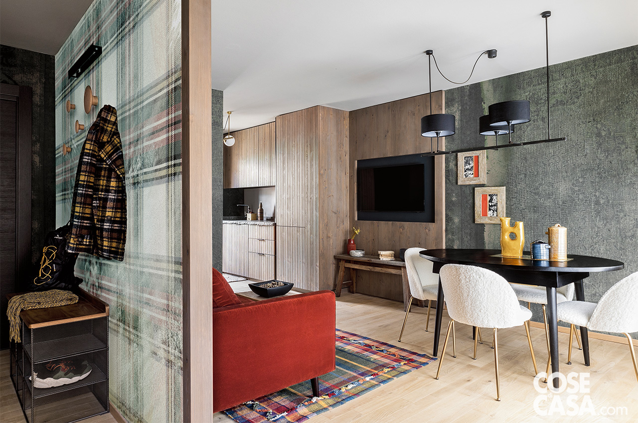 ingresso e zona giorno con tavolo ovale nero ingresso e zona giorno con tavolo ovale nero