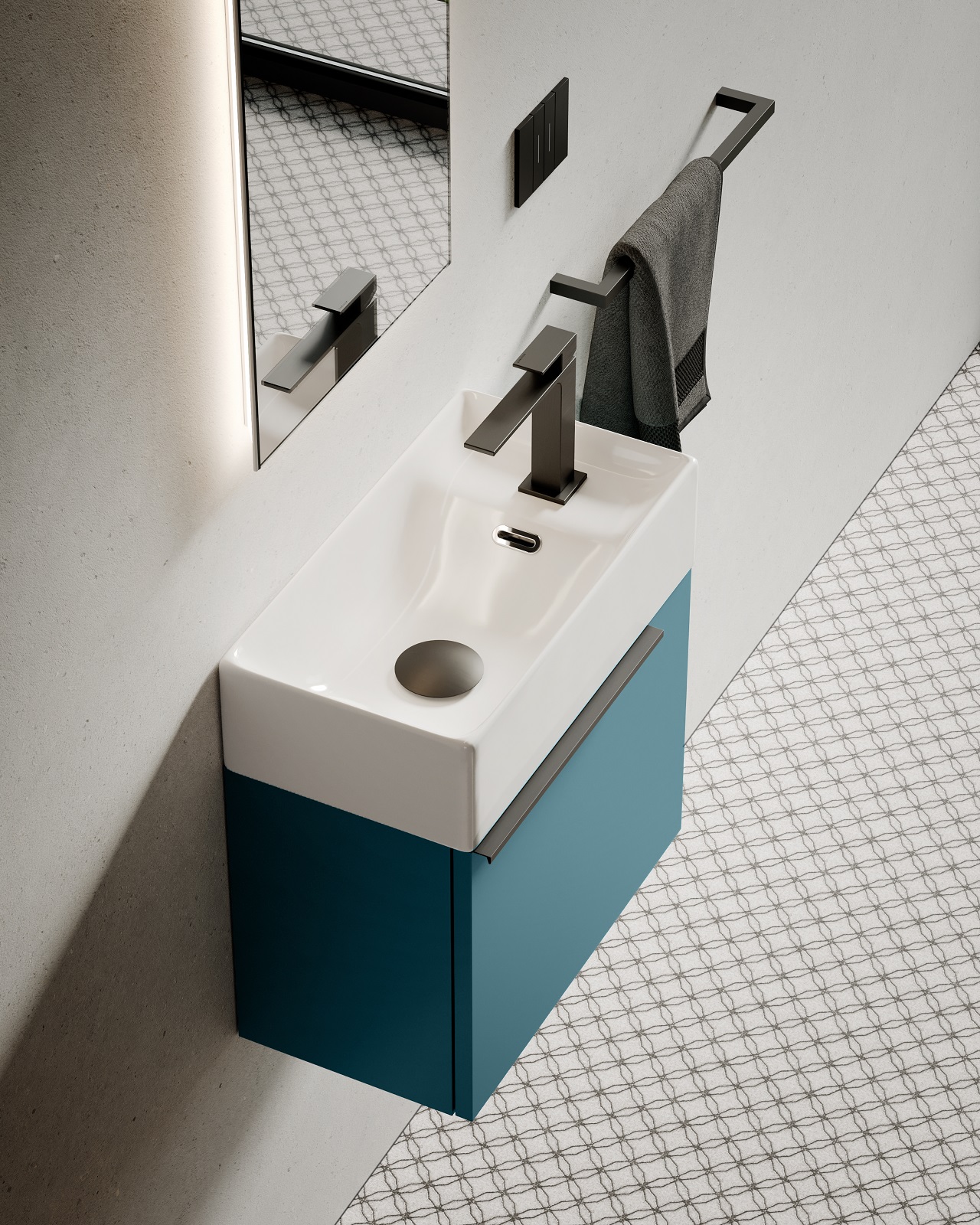 Il lavamani con lavabo Touch in ceramica bianca lucida della collezione My Time di Ideagroup è abbinato alla base in laccato titanio opaco laccato blu rana. La base misura L 45 x P 24,5 x H 33,5 cm; il lavabo misura L 46 x P 25 x H 12,5 cm. Prezzo su richiesta. www.ideagroup.it
