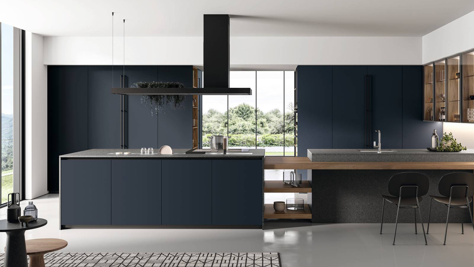 Un'intensa colorazione blu per le ante lisce in laccato opaco della composizione Time di Arredo3 che si articola in un'isola formata da due corpi principali con bancone snack e in una doppia fila di colonne che crea un parete contenitiva di separazione, illuminata e alleggerita dalla fila di pensili in noce Imperial con anta Teca. Il piano di lavoro è in Cosmolite star grey. Prezzo su richiesta. www.arredo3.it