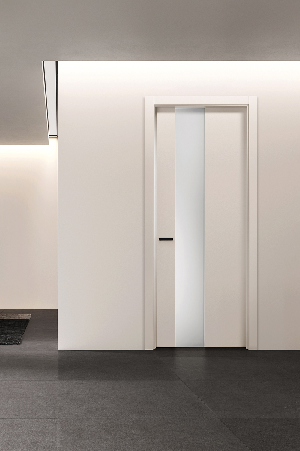 Nell’immagine porta Liss abbinata al telaio Genius Eleva qui proposta nella nuova finitura Grigio con apertura a battente e maniglia Pure Nera.