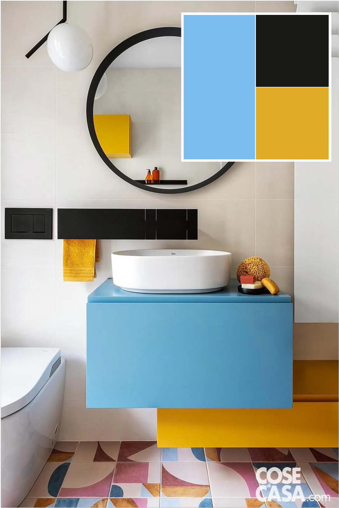 Bagno con mobile lavabo celeste intenso e giallo. Progetto e styling: arch. Martina Chiara Maria Pozzi. Foto: Riccardo Gasperoni.