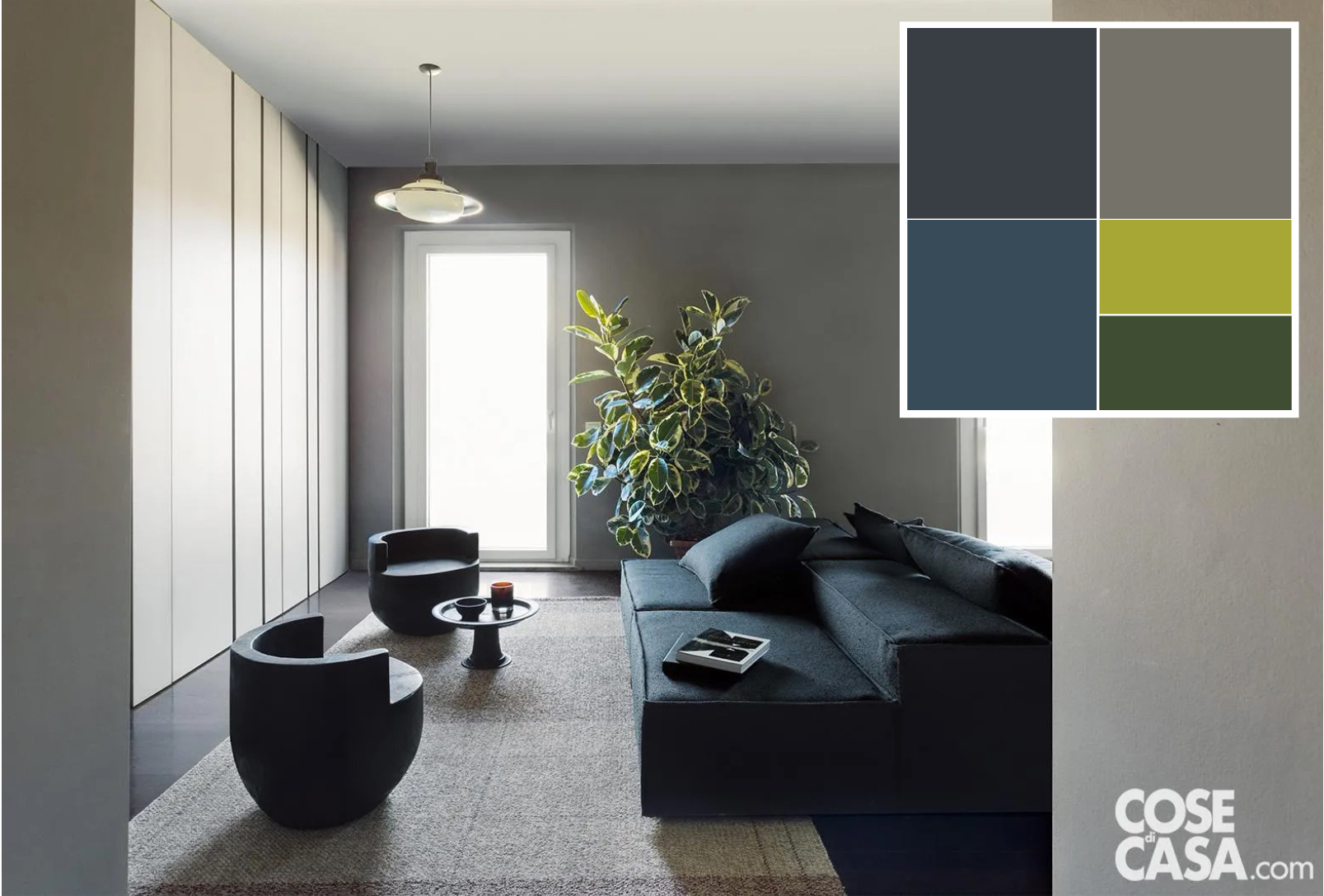 Il soggiorno con sedute color antracite resta neutro: le poltroncine di design, in continuità con la struttura degli imbottiti, aumentano il contrasto con pareti e tappeto declinati in sfumature di grigio più chiaro. Foto: Studio Roy. Styling: Lidia Elisa Covello. Progetto: META- Interior Architecture Milano (arch. Caterina Marazzi, arch. Luca Miserocchi). Il soggiorno con sedute color antracite resta neutro: le poltroncine di design, in continuità con la struttura degli imbottiti, aumentano il contrasto con pareti e tappeto declinati in sfumature di grigio più chiaro. Foto: Studio Roy. Styling: Lidia Elisa Covello. Progetto: META- Interior Architecture Milano (arch. Caterina Marazzi, arch. Luca Miserocchi).