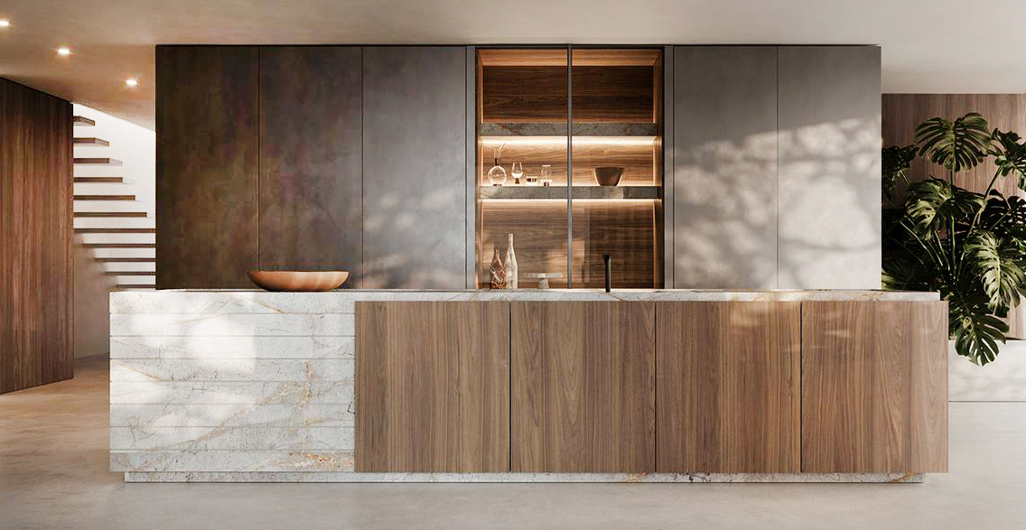 Materiali naturali e lavorazioni artigianali per la cucina Art di Modulnova che ha le basi dell'isola rivestite in gres nella finitura Marmo Appennino, come il top, e in legno oliato nella variante Noce Classic. Le ante sono caratterizzate da un telaio integrato e nascosto all'interno dell'unico profilo verticale che funge da maniglia. http://www.modulnova.it - Fuorisalone, Modulnova Milano  – Corso Garibaldi 99, Milano.