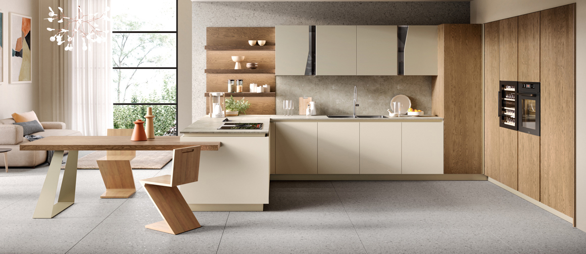 Una composizione a ferro di cavallo, pratica e funzionale, per Venere di Moretti Compact Cucine: a destra una serie di capienti colonne attrezzate e a sinistra una penisola con un ampio tavolo da pranzo a sbalzo, collegate da basi con piano in laminato HPL Rocks e pensili. Le ante lisce sono in Laccato Opaco Tortora e impiallacciate Rovere Tabacco. Un modulo base da 60 cm escluso piano, prezzo 289 euro. https://cucine.moretticompact.it Una composizione a ferro di cavallo, pratica e funzionale, per Venere di Moretti Compact Cucine: a destra una serie di capienti colonne attrezzate e a sinistra una penisola con un ampio tavolo da pranzo a sbalzo, collegate da basi con piano in laminato HPL Rocks e pensili. Le ante lisce sono in Laccato Opaco Tortora e impiallacciate Rovere Tabacco. Un modulo base da 60 cm escluso piano, prezzo 289 euro. https://cucine.moretticompact.it