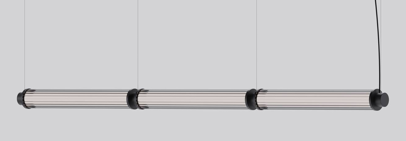 Fa parte della nuova collezione Missori di Stilnovo la lampada a sospensione sofisticata e scenografica che è composta da una struttura in metallo modulare abbinata a raffinati diffusori in vetro cannettato.  https://www.stilnovo.com - Fuorisalone, Come  Archeologi – Stilnovo Showroom – Via Boccaccio 15A, Milano.
