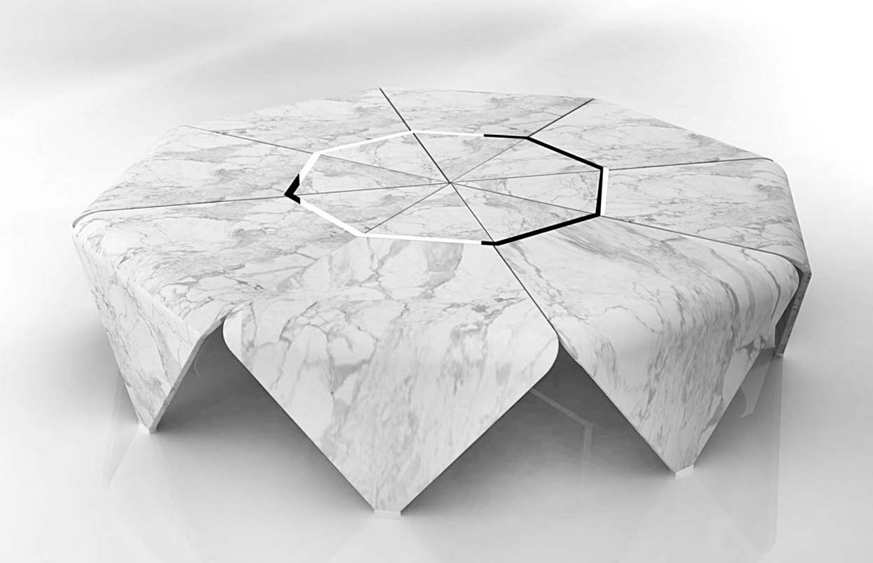 Marmo bianco per il grande tavolo basso Baloise di Diviana, il brand che fonde la tradizione orientale con il design italiano. Il materiale pregiato e la forma a raggi del piano lo trasformano in  in un pezzo di arredo scenografico, con uno stile senza tempo. https://diviana.in – Fuorisalone, FlagShip Store – Via Monte di Pietà 13/1, Milano.