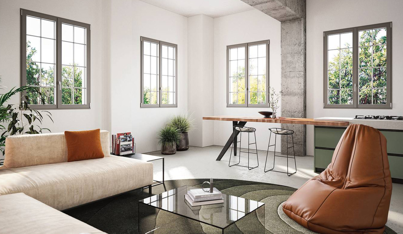 Stile industrial per le finestre in alluminio Titano Steel di Oknoplast con sagomature decorative sul profilo esterno. Ha tre guarnizioni e può avere canaline termiche e isolante che riducono le dispersioni, con trasmittanza Uw fino a 0,80 W/m²K. Sicurezza antieffrazione fino a RC2. www.oknoplast.it