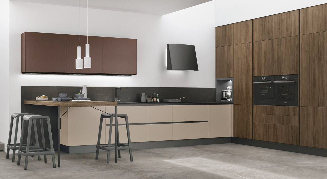 Finiture in contrasto per la cucina ad angolo Infinity di Stosa: Rovere Liquirizia per le colonne della grande armadiatura laterale, Pet Metal Bronze per i pensili e Pet Ginseng opaco per le basi. La nicchia angolare con luce integrata, in cui possono essere sistemati piccoli elettrodomestici da tenere a portata di mano, ma non in vista. Un modulo base da 60 cm, prezzo a partire da 161 euro + Iva. https://www.stosacucine.com Finiture in contrasto per la cucina ad angolo Infinity di Stosa: Rovere Liquirizia per le colonne della grande armadiatura laterale, Pet Metal Bronze per i pensili e Pet Ginseng opaco per le basi. La nicchia angolare con luce integrata, in cui possono essere sistemati piccoli elettrodomestici da tenere a portata di mano, ma non in vista. Un modulo base da 60 cm, prezzo a partire da 161 euro + Iva. https://www.stosacucine.com