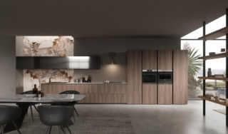 Il ritorno del legno si traduce nel successo dell’anta Rigoletto Plus in noce americano naturale di Aran, scelta per le basi con gola in alluminio nero e per le colonne dotate di apertura push & pull della composizione LAB13. Le scanalature verticali e regolari ottenute dalla lavorazione cannetè offrono dinamismo e ritmo a quella che apparentemente è una distribuzione lineare. Il top in grès color magellano della zona operativa si espande per tutta la lunghezza e l’altezza della parete adibita a zona lavaggio, fungendo da schienale. I pensili, laccati in metallo liquido piombo, sono progettati con un sistema di apertura a ribalta per favorire l’organizzazione interna di utensili da cucina o ingredienti. Prezzo a partire 810 euro + Iva per modulo base da 60 cm. www.arancucine.it Il ritorno del legno si traduce nel successo dell’anta Rigoletto Plus in noce americano naturale di Aran, scelta per le basi con gola in alluminio nero e per le colonne dotate di apertura push & pull della composizione LAB13. Le scanalature verticali e regolari ottenute dalla lavorazione cannetè offrono dinamismo e ritmo a quella che apparentemente è una distribuzione lineare. Il top in grès color magellano della zona operativa si espande per tutta la lunghezza e l’altezza della parete adibita a zona lavaggio, fungendo da schienale. I pensili, laccati in metallo liquido piombo, sono progettati con un sistema di apertura a ribalta per favorire l’organizzazione interna di utensili da cucina o ingredienti. Prezzo a partire 810 euro + Iva per modulo base da 60 cm. www.arancucine.it