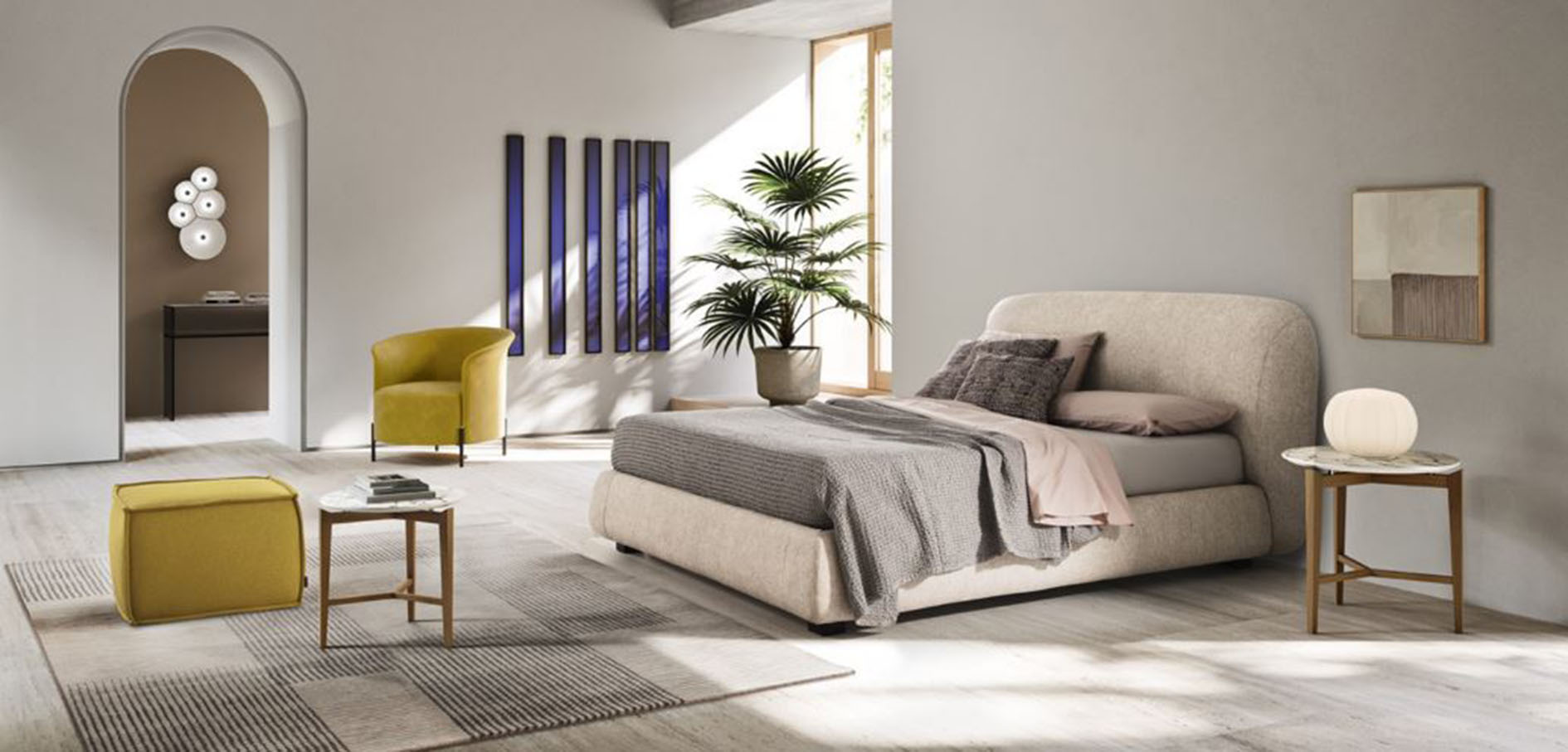 Volumi scultorei per il letto Noa di Calligaris che è dotato di una testata riccamente imbottita e morbida; le cuciture presenti sul rivestimento tessile delle superfici curve esaltano l'effetto tridimensionale. Misura L 204 x P 230 x H 109 cm. Prezzo a partire da 2.457 euro.  https://www.calligaris.com