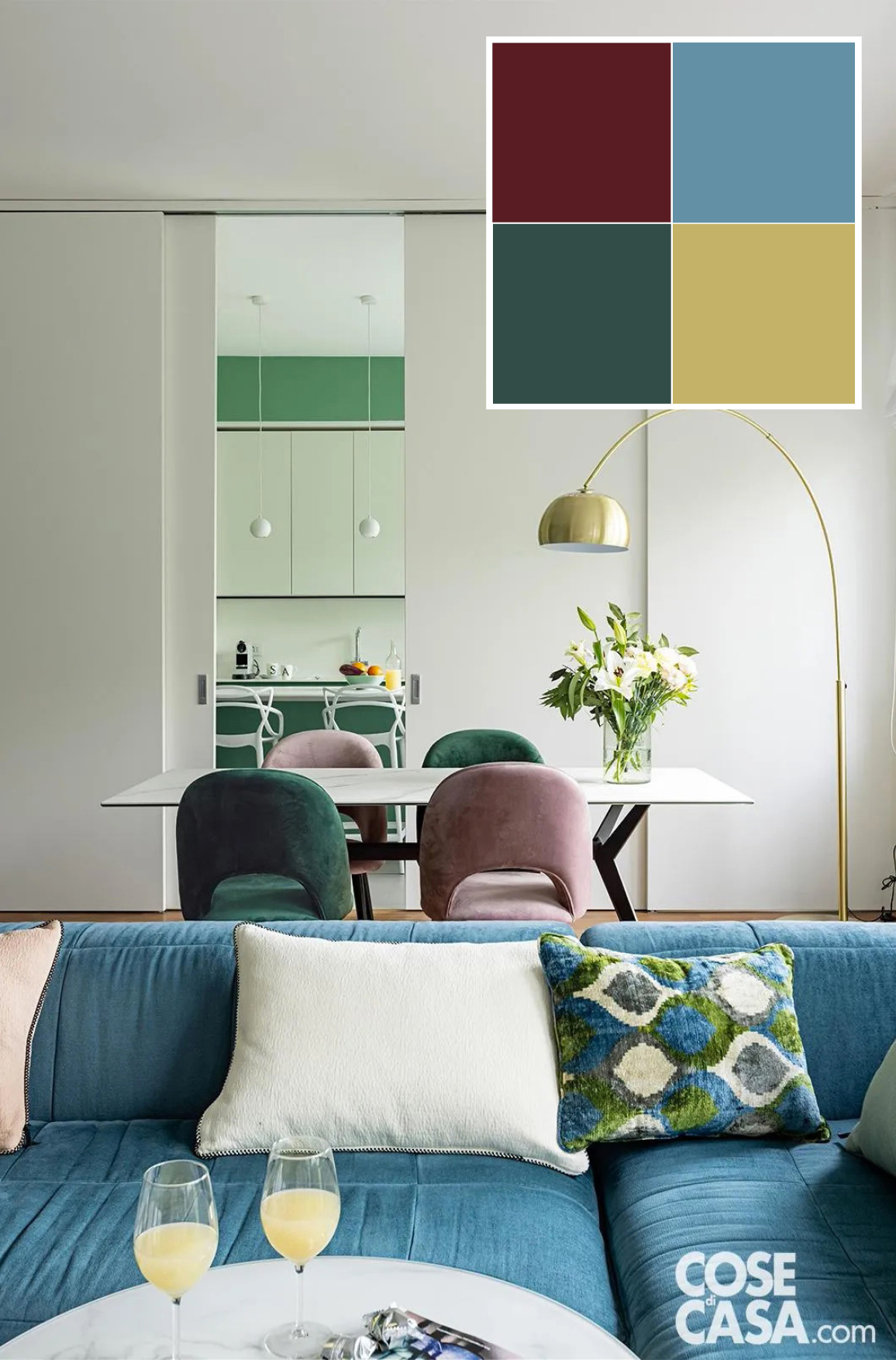 In questa zona giorno, che include pranzo e salotto e che al di là di una porta scorrevole lascia intravedere la cucina, il vinaccia colora due delle quattro sedie in velluto, in alternanza con altre due di tonalità verde intenso. Il verde è ripreso anche nei mobili della cucina, che, quando la parete scorrevole è lasciata aperta, si vede di fronte al tavolo da pranzo del living, mentre alle spalle del tavolo da pranzo l'area salotto è dominata dall'azzurro del divano: l'insieme risulta così vivace, moderno e molto elegante. Progetto arch. Francesca Bonavia, Studio MB5 Architettura, Milano http://www.mb5.it - Foto Cristina Galliena Bohman - Styling Laura Mauceri In questa zona giorno, che include pranzo e salotto e che al di là di una porta scorrevole lascia intravedere la cucina, il vinaccia colora due delle quattro sedie in velluto, in alternanza con altre due di tonalità verde intenso. Il verde è ripreso anche nei mobili della cucina, che, quando la parete scorrevole è lasciata aperta, si vede di fronte al tavolo da pranzo del living, mentre alle spalle del tavolo da pranzo l'area salotto è dominata dall'azzurro del divano: l'insieme risulta così vivace, moderno e molto elegante. Progetto arch. Francesca Bonavia, Studio MB5 Architettura, Milano http://www.mb5.it - Foto Cristina Galliena Bohman - Styling Laura Mauceri