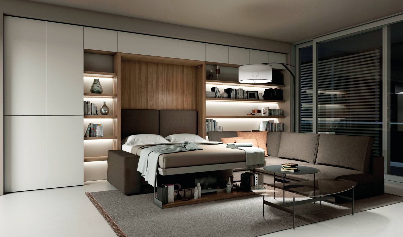 L'armadio a ponte fa parte del sistema componibile su misura Making Room di Clei con divano trasformabile Tango 198 e letto matrimoniale integrato, in versione notte. La composizione misura L 5,5 x H 2,567 m. Disponibile in diverse finiture e con svariati accessori che possono modificare il prezzo in diminuzione o in aumento, completa di divano/letto integrato ed illuminazione ha un prezzo di circa 16.900 euro. www.clei.it L'armadio a ponte fa parte del sistema componibile su misura Making Room di Clei con divano trasformabile Tango 198 e letto matrimoniale integrato, in versione notte. La composizione misura L 5,5 x H 2,567 m. Disponibile in diverse finiture e con svariati accessori che possono modificare il prezzo in diminuzione o in aumento, completa di divano/letto integrato ed illuminazione ha un prezzo di circa 16.900 euro. www.clei.it