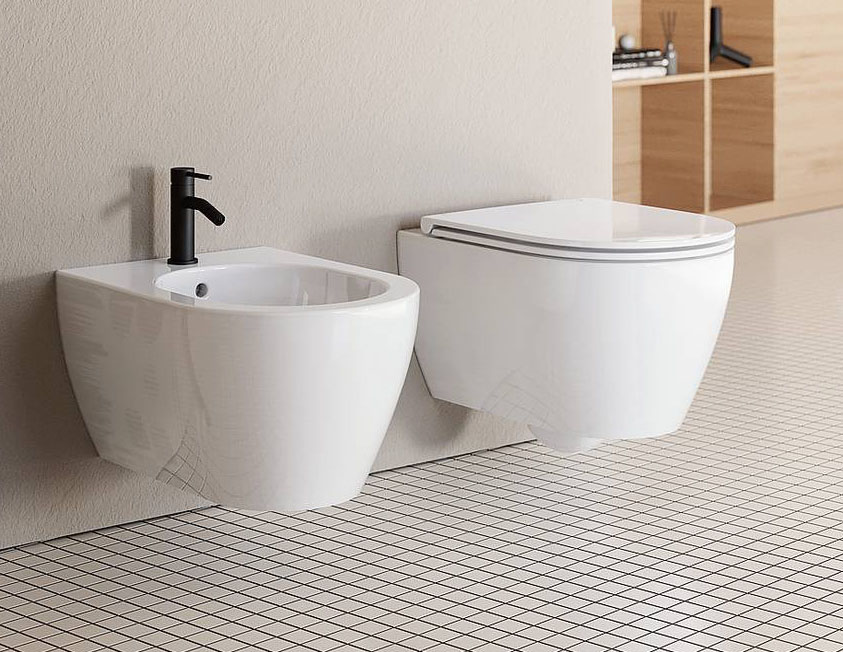 Il vaso Glam di Scarabeo, con scarico Clean Flush, consente il risparmio idrico e limita il rumore. Misura L 36 x P 50,5 cm e costa 420 euro + Iva; il bidet costa 320 euro + Iva. www.scarabeoceramiche.it Il vaso Glam di Scarabeo, con scarico Clean Flush, consente il risparmio idrico e limita il rumore. Misura L 36 x P 50,5 cm e costa 420 euro + Iva; il bidet costa 320 euro + Iva. www.scarabeoceramiche.it